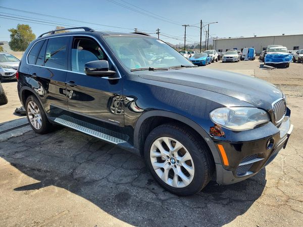 2013 BMW X5 xDrive35i — Passenger 3/4