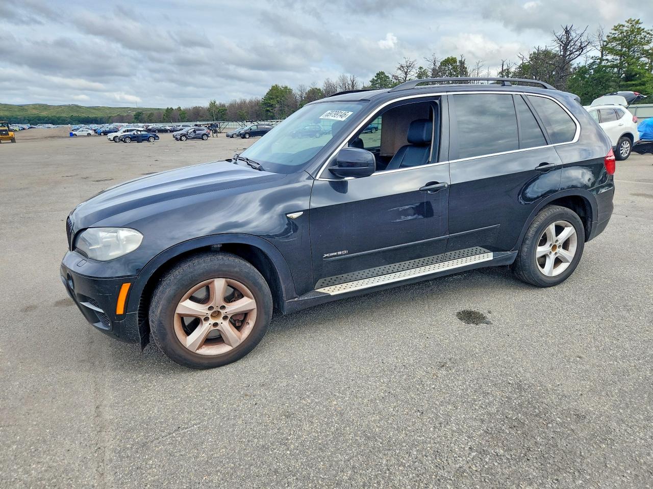 2013 BMW X5 xDrive50i — Front 3/4