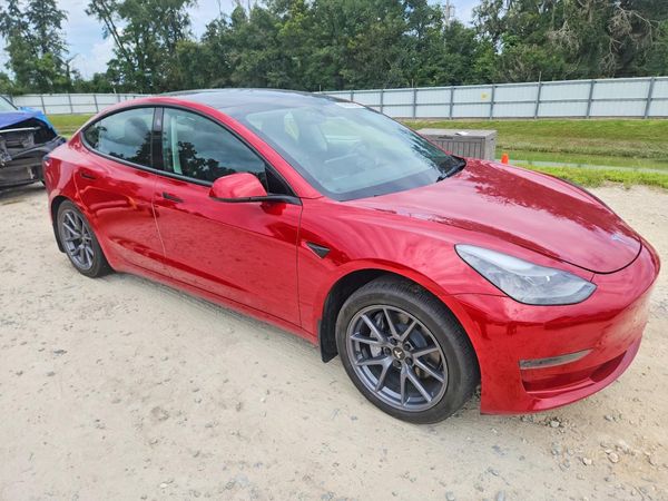 2023 TESLA MODEL 3 — Passenger 3/4