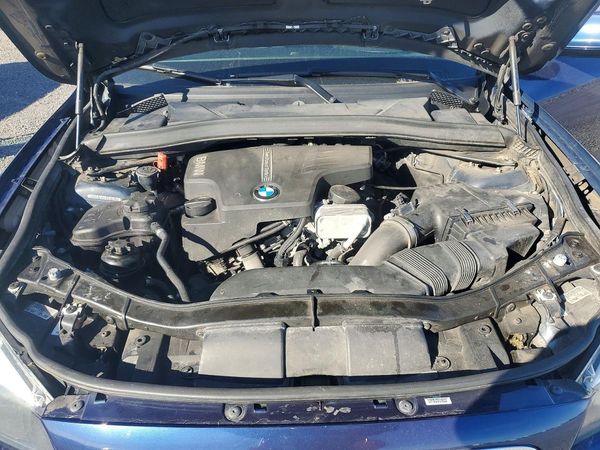 2012 BMW X1 xDrive28i — Engine bay