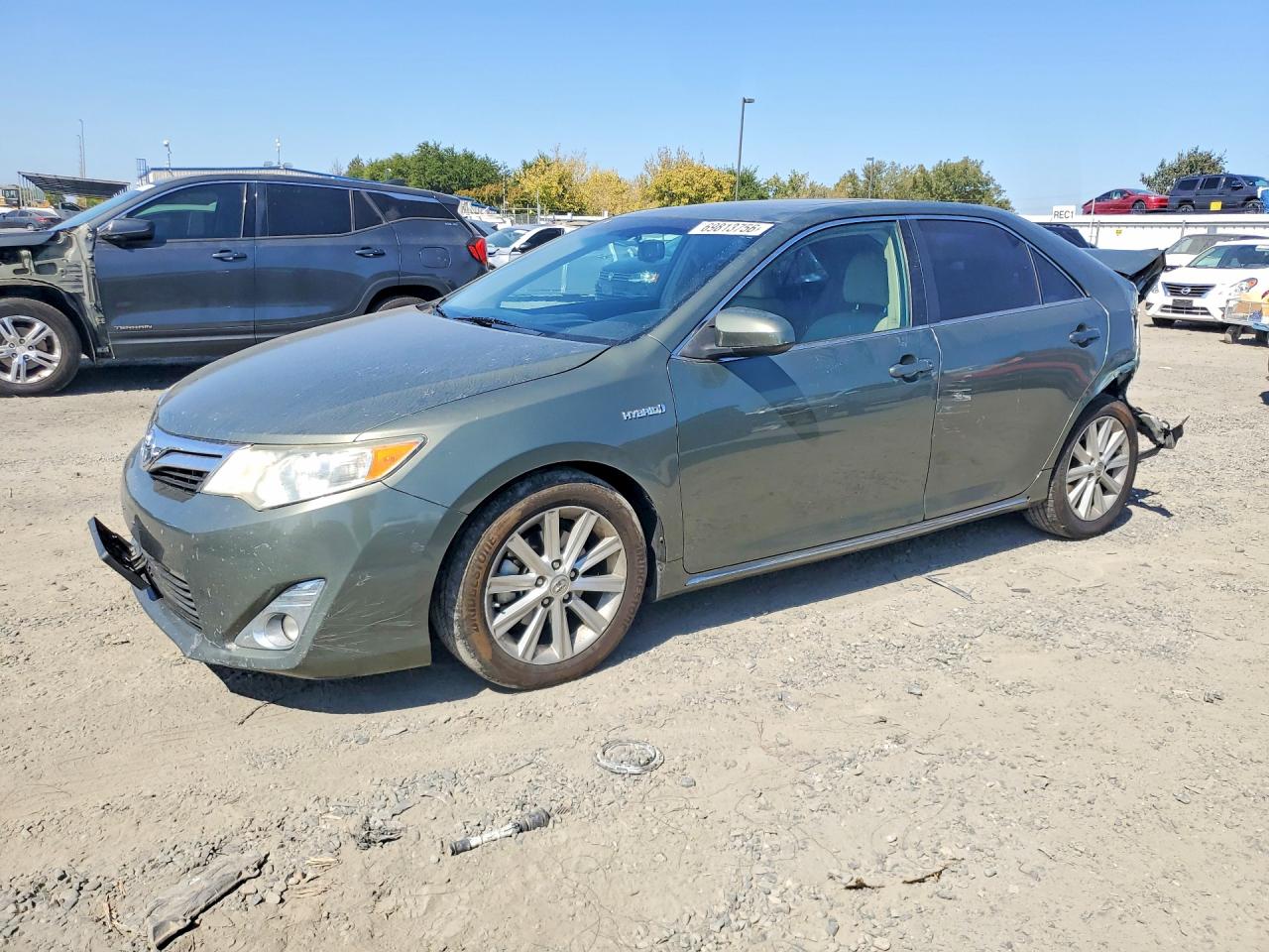 2013 TOYOTA CAMRY SOLA Hybrid — Front 3/4