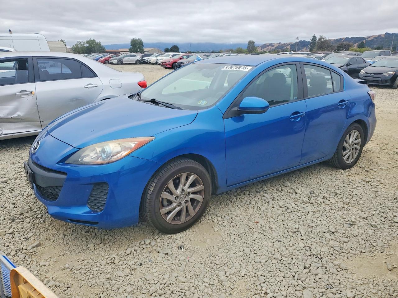2012 MAZDA 3 Touring/GS — Front 3/4