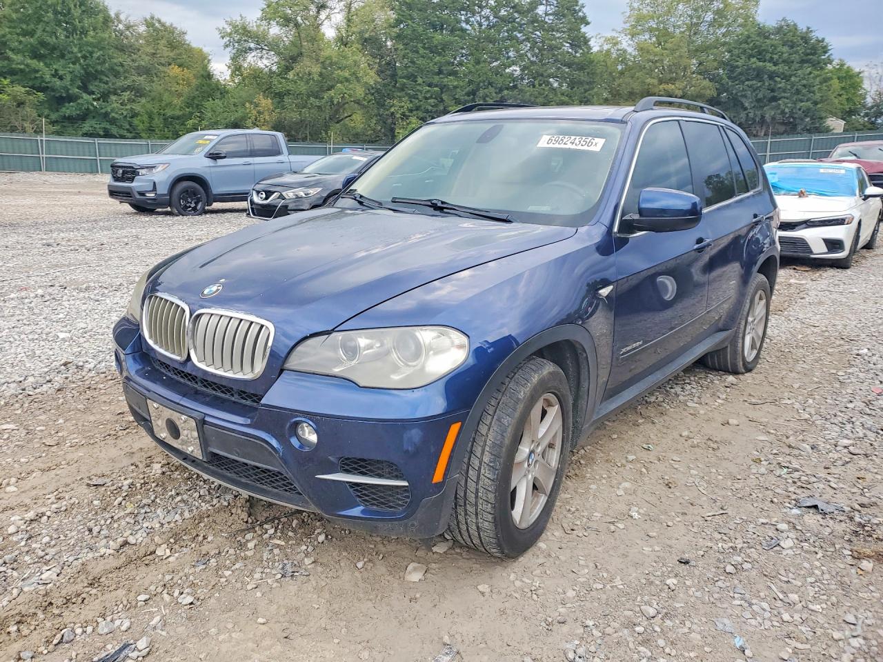 2012 BMW X5 xDrive35d — Front 3/4