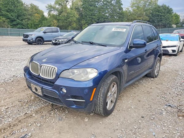 2012 BMW X5 xDrive35d — Front 3/4