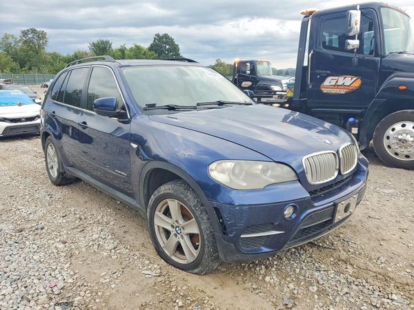 2012 BMW X5 xDrive35d — Passenger 3/4