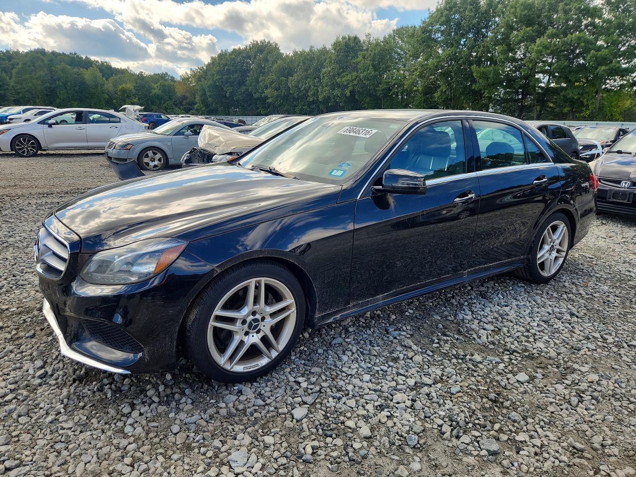 2014 MERCEDES-BENZ E E350 — Front 3/4
