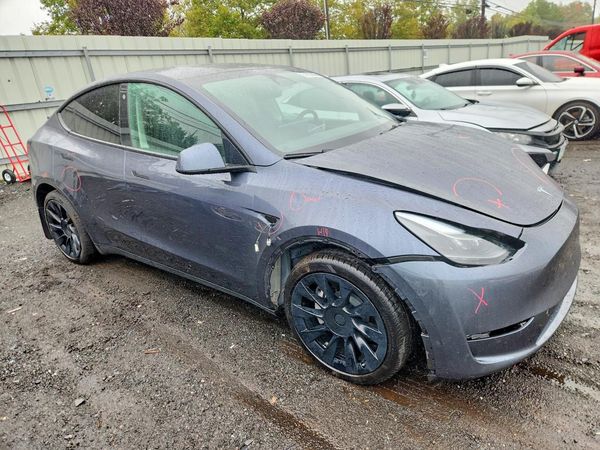 2023 TESLA MODEL Y — Passenger 3/4