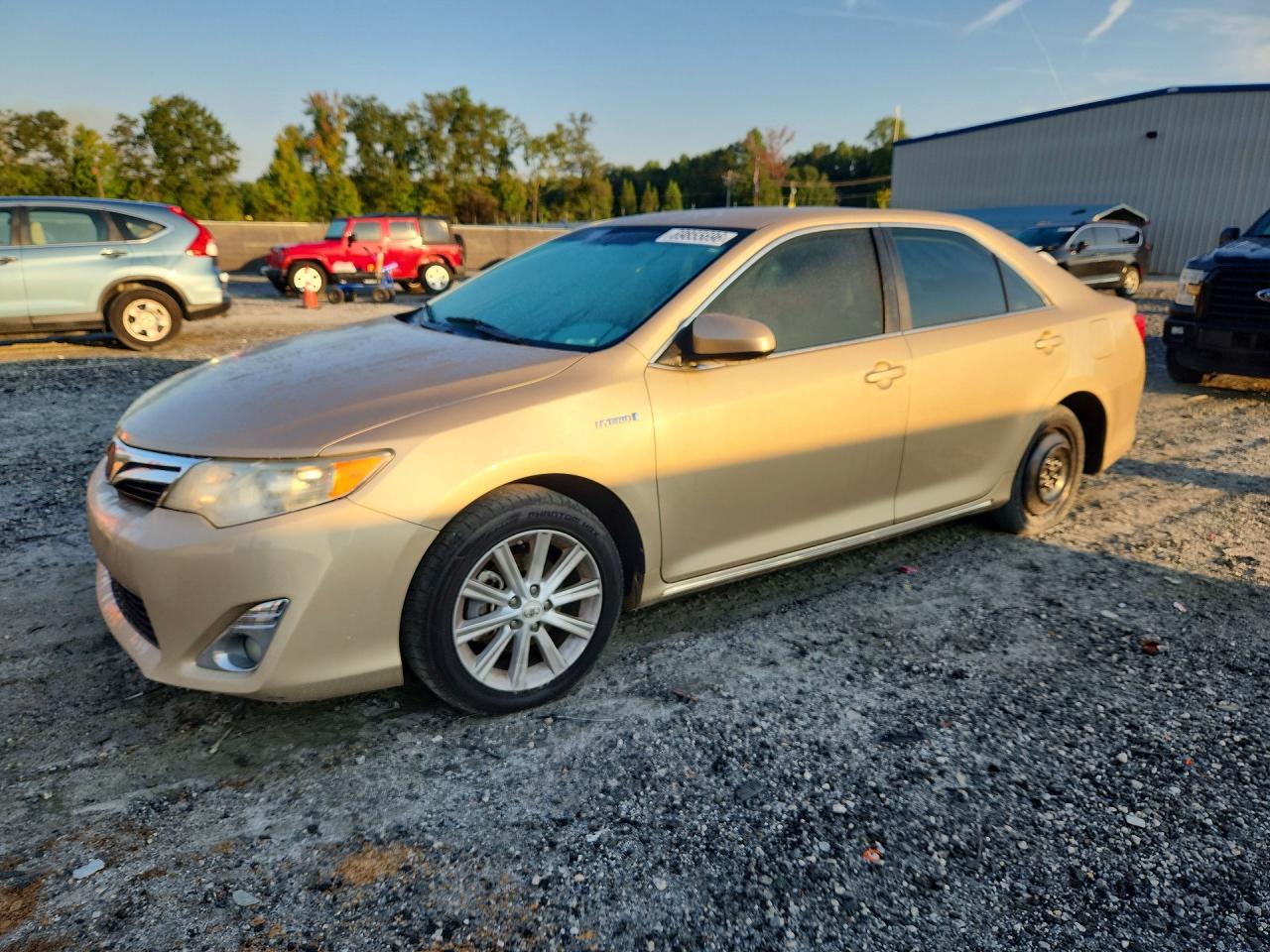 2012 TOYOTA CAMRY SOLA Hybrid — Front 3/4