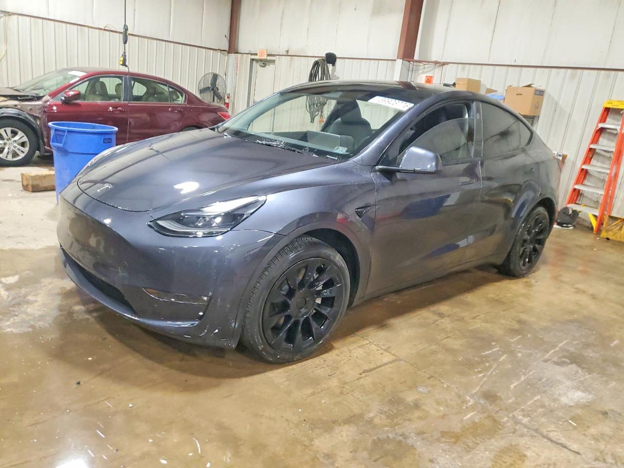 2024 TESLA MODEL Y — Front 3/4