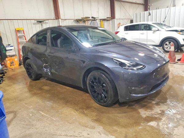 2024 TESLA MODEL Y — Passenger 3/4