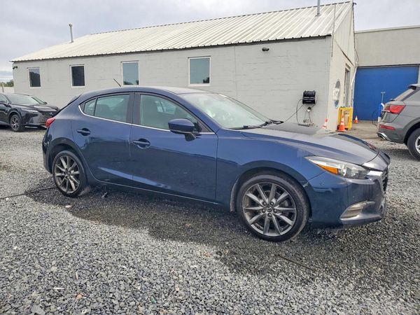 2018 MAZDA 3 Touring — Passenger 3/4
