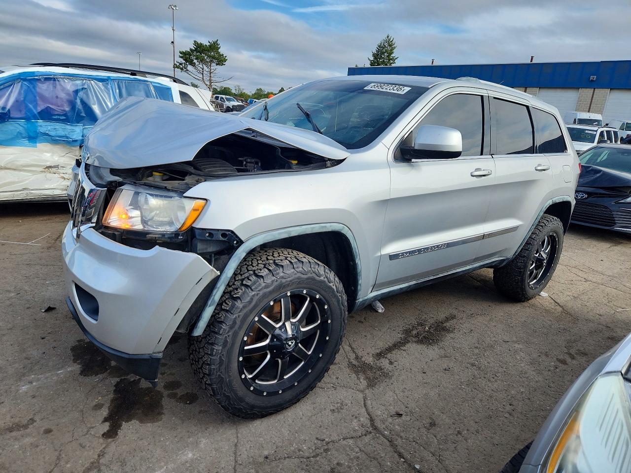 2012 JEEP CHEROKEE Laredo — Front 3/4