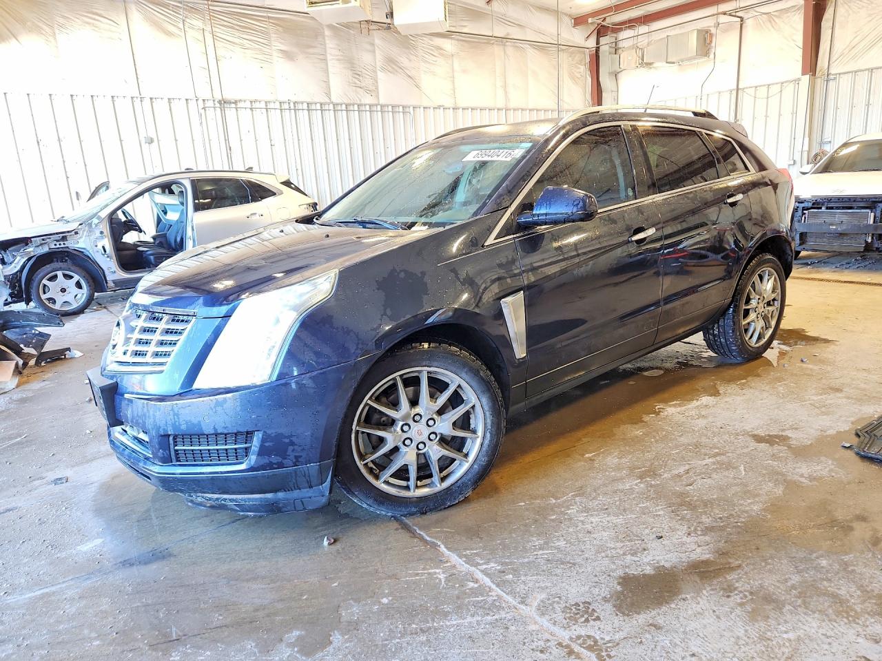 2014 CADILLAC SRX Luxury — Front 3/4