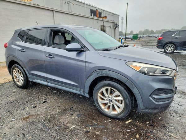 2016 HYUNDAI TUCSON SE — Passenger 3/4