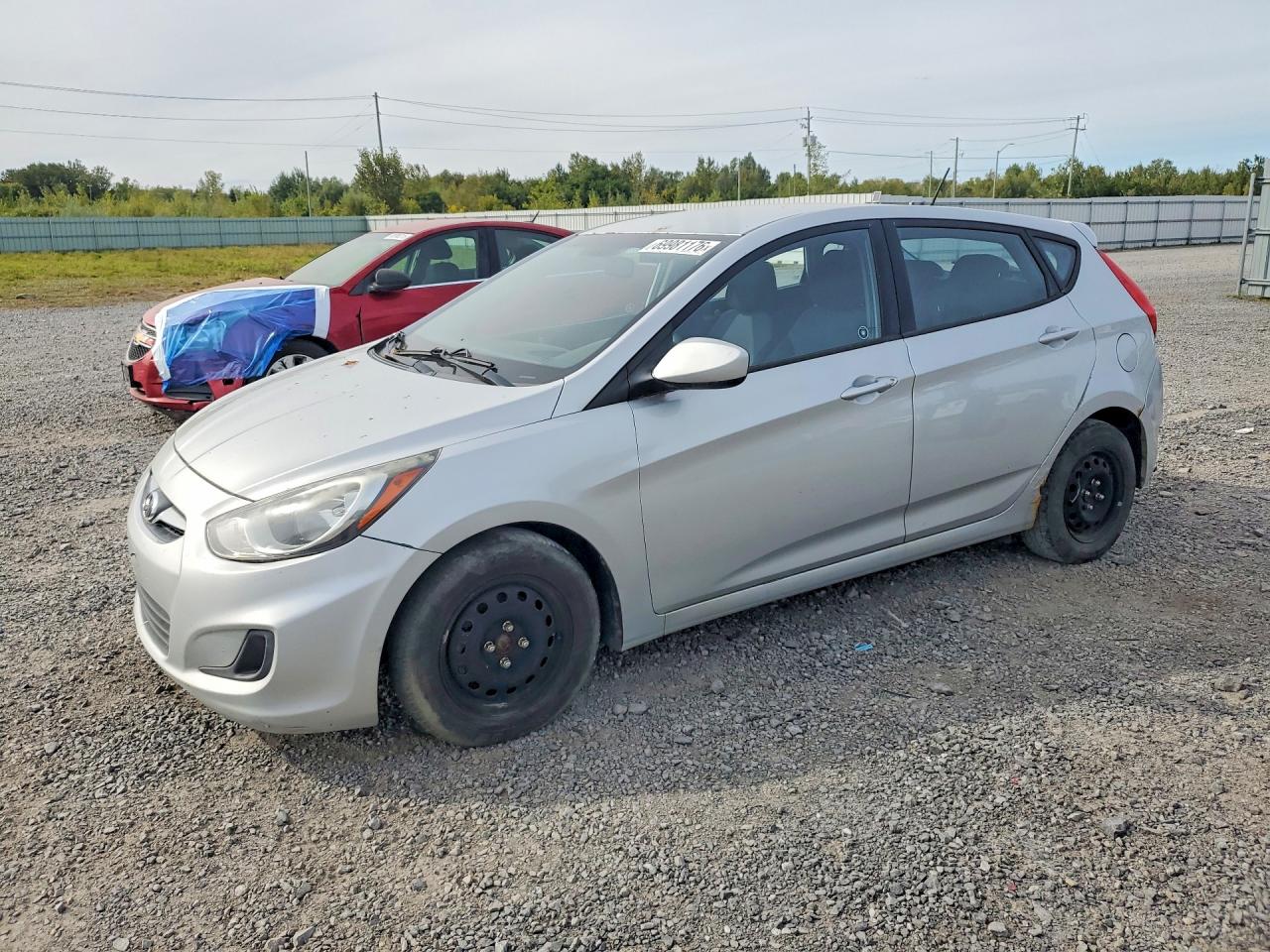 2014 HYUNDAI ACCENT 5DR GS / 4DR GLS — Front 3/4