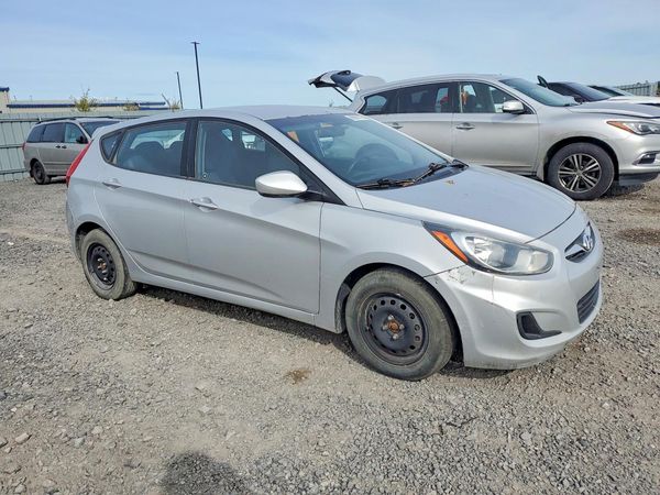 2014 HYUNDAI ACCENT 5DR GS / 4DR GLS — Passenger 3/4