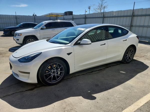 2023 TESLA MODEL 3 — Front 3/4