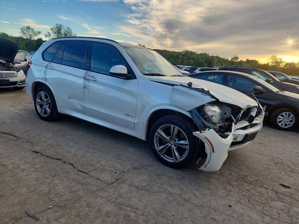 2014 BMW X5 xDrive35i — Passenger 3/4