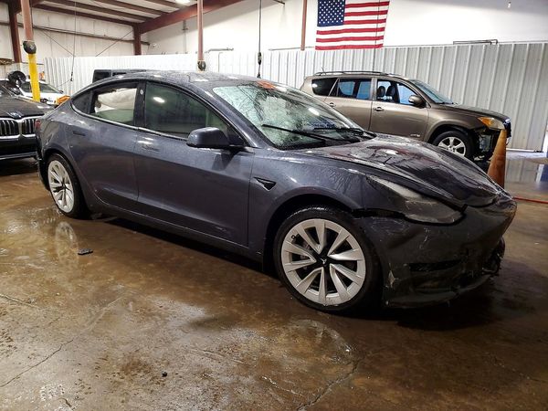 2023 TESLA MODEL 3 — Passenger 3/4