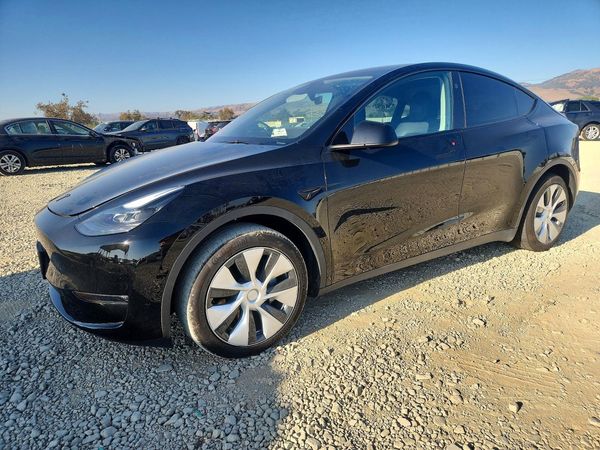 2024 TESLA MODEL Y — Front 3/4