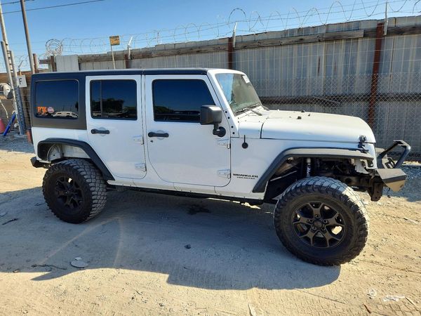 2016 JEEP WRANGLER UNLIMITED Sport — Passenger 3/4