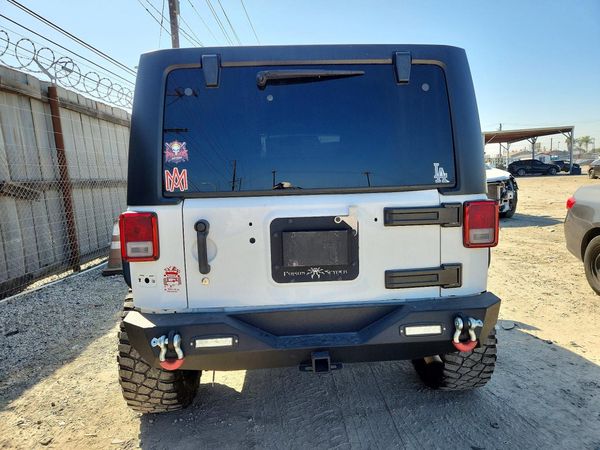 2016 JEEP WRANGLER UNLIMITED Sport — DIRR