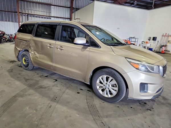 2016 KIA SEDONA LX - Middle-low — Passenger 3/4