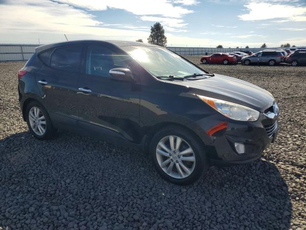 2013 HYUNDAI TUCSON — Passenger 3/4