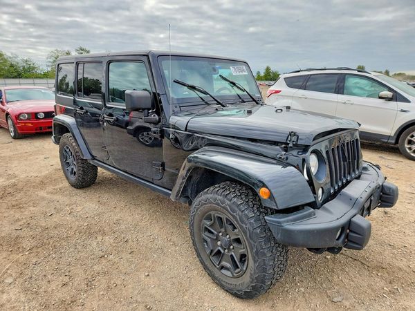 2016 JEEP WRANGLER UNLIMITED Sahara — Passenger 3/4