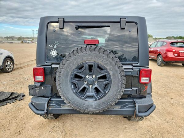 2016 JEEP WRANGLER UNLIMITED Sahara — DIRR