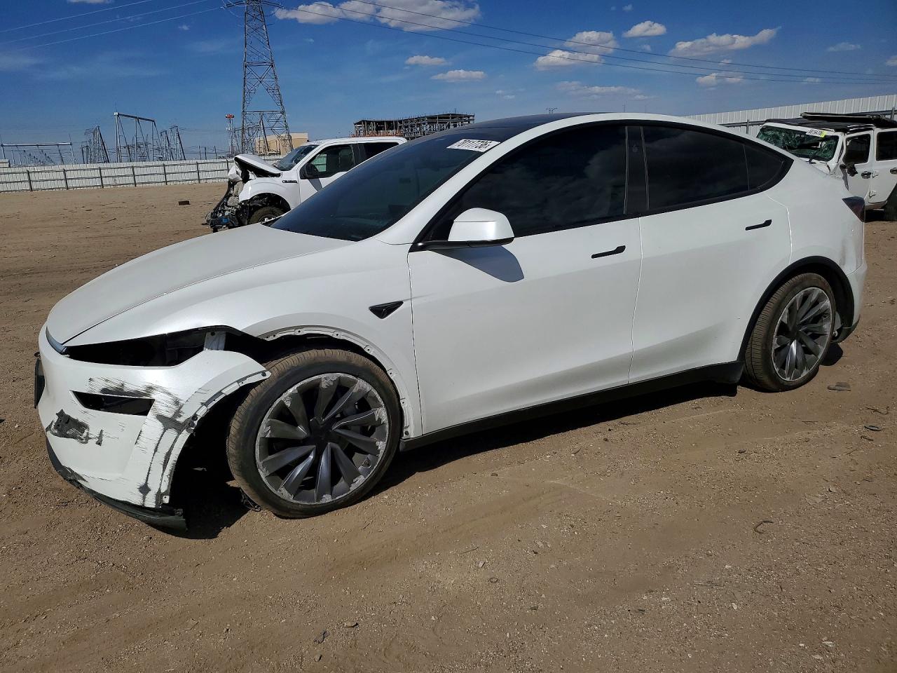 2026 TESLA MODEL Y — Front 3/4