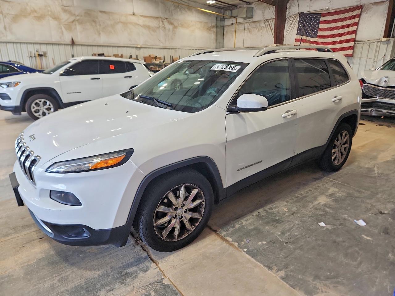 2016 JEEP CHEROKEE Limited — Front 3/4