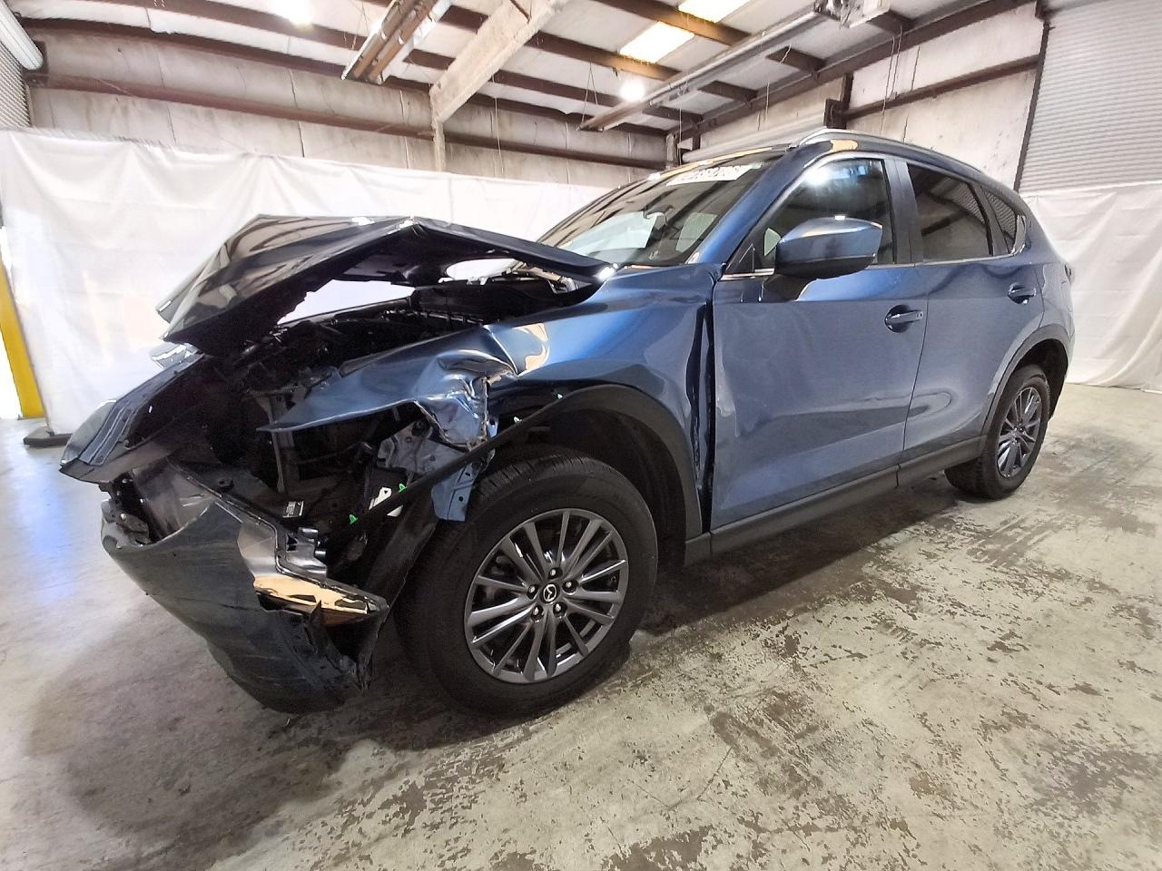 2019 MAZDA CX-5 Touring — Front 3/4
