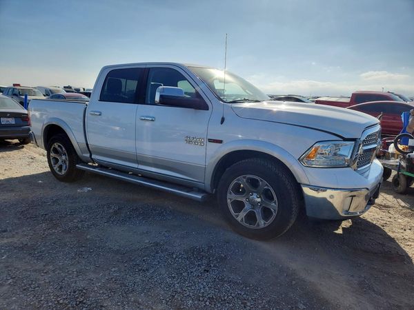 2016 RAM 1500 Laramie — Passenger 3/4