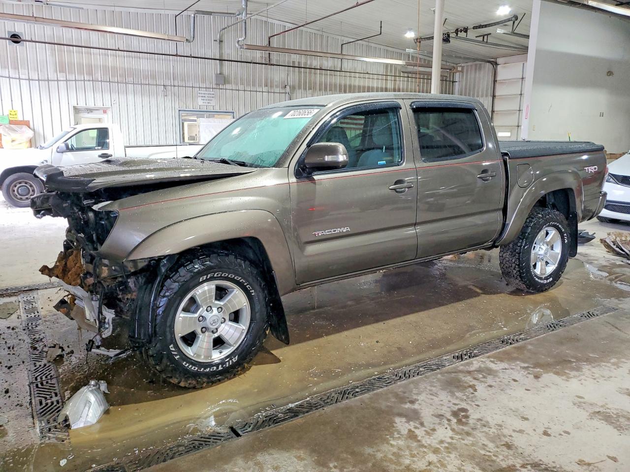 2013 TOYOTA TACOMA Delux — Front 3/4
