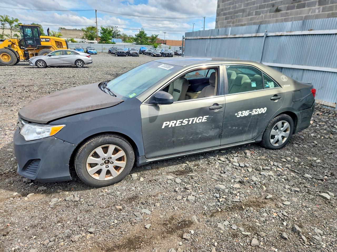 2014 TOYOTA CAMRY — Front 3/4