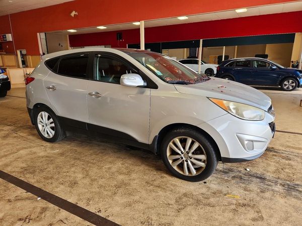 2013 HYUNDAI TUCSON — Passenger 3/4
