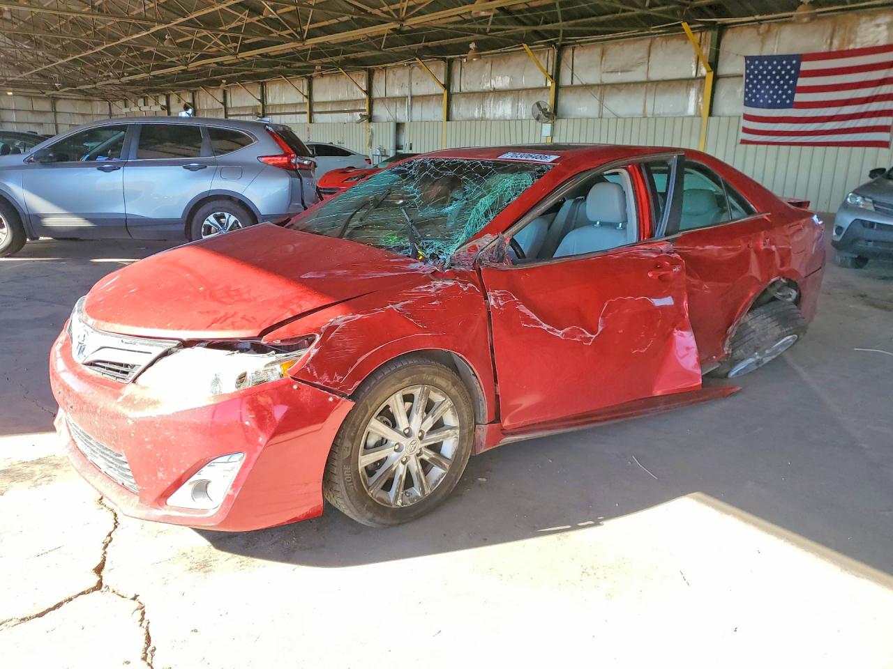 2012 TOYOTA CAMRY SOLA Hybrid — Front 3/4
