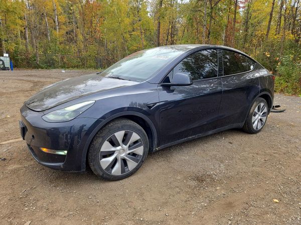 2024 TESLA MODEL Y — Front 3/4