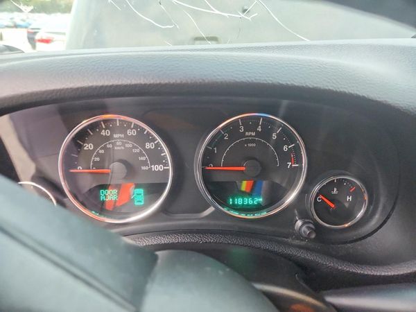 2015 JEEP WRANGLER Sahara — ODOM