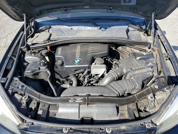 2015 BMW X1 sDrive28i — Engine bay