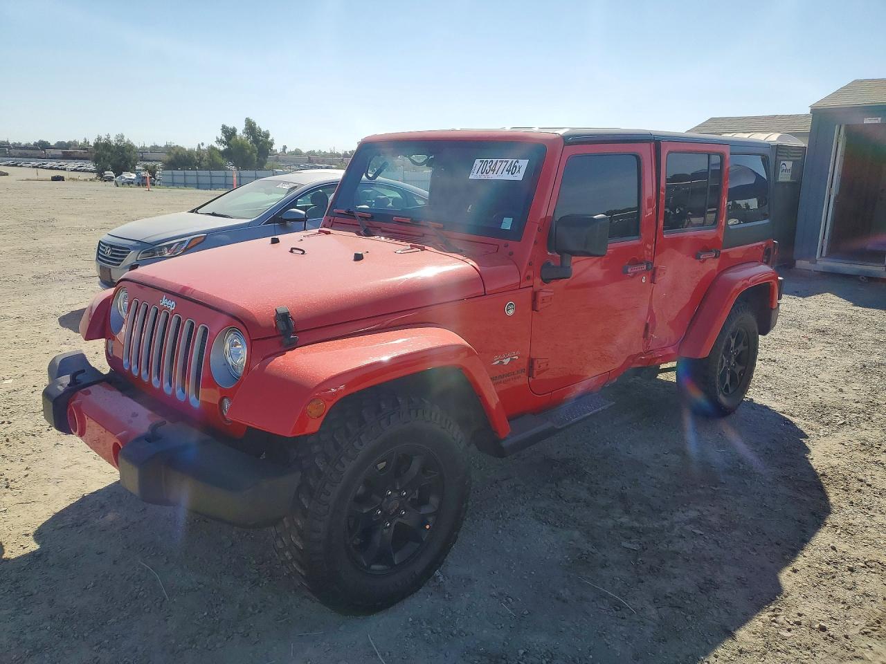 2017 JEEP WRANGLER UNLIMITED SAHARA 4X4 — Front 3/4