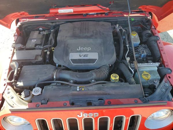 2017 JEEP WRANGLER UNLIMITED SAHARA 4X4 — Engine bay