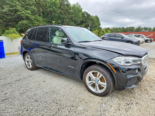 2016 BMW X5 xDrive40e — Passenger 3/4
