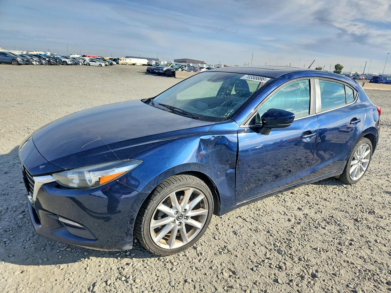 2017 MAZDA 3 Touring — Front 3/4