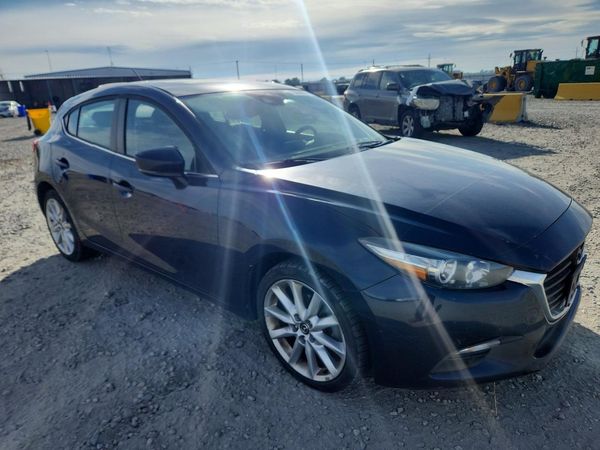 2017 MAZDA 3 Touring — Passenger 3/4