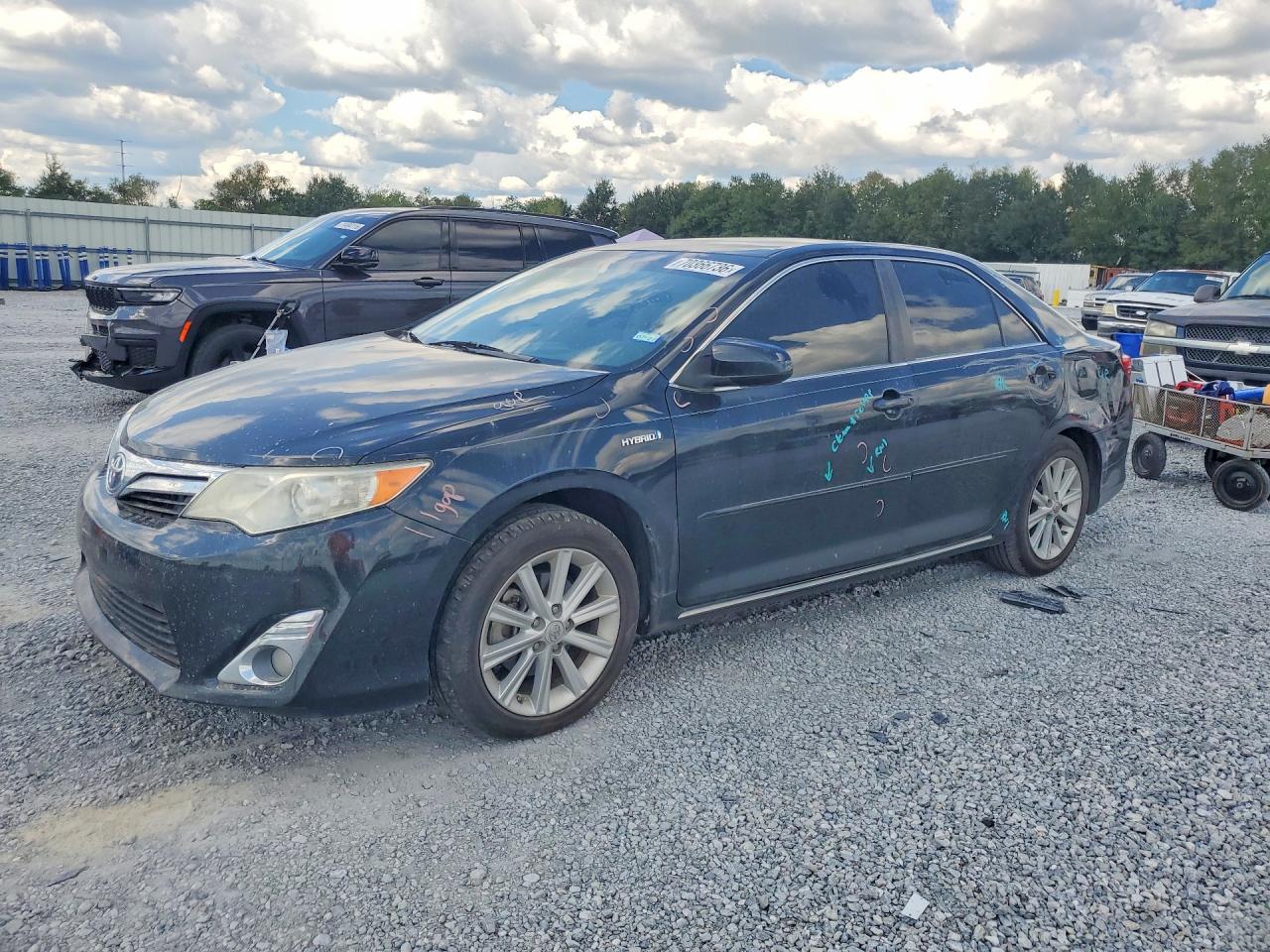 2013 TOYOTA CAMRY SOLA Hybrid — Front 3/4