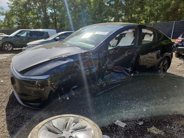 2026 TESLA MODEL Y — Front 3/4