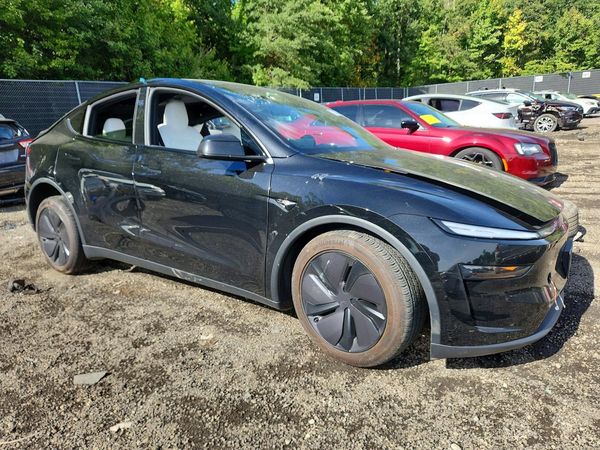 2026 TESLA MODEL Y — Passenger 3/4