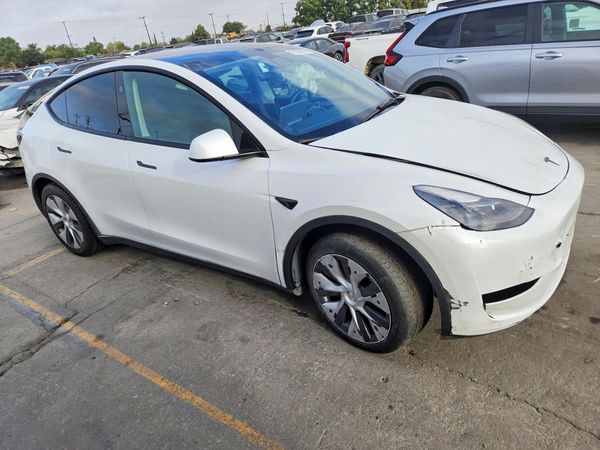 2024 TESLA MODEL Y — Passenger 3/4